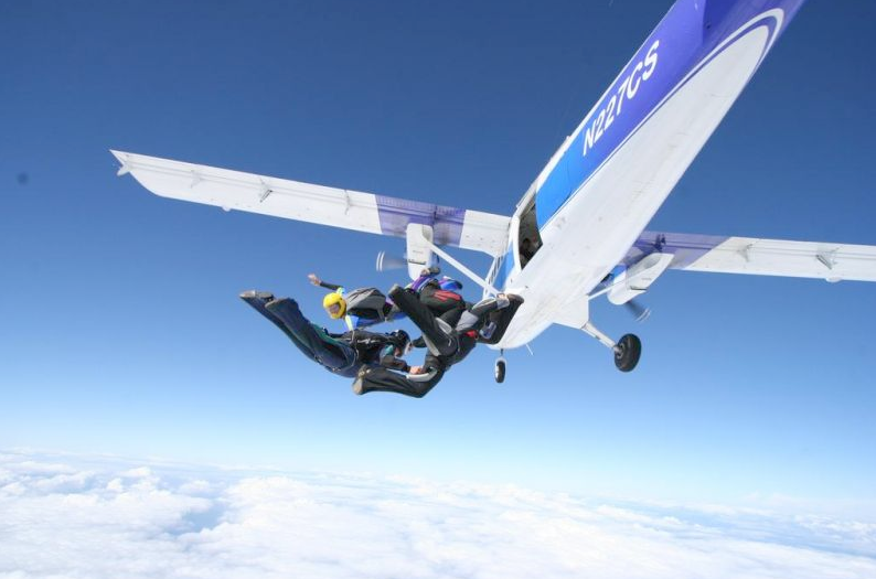 Leaving the plane in formation.