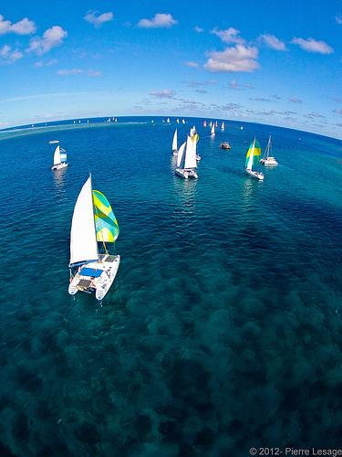 Sailboats in French Polynesian waters. Courtesy of Pierre Lesage, flickr.com. 