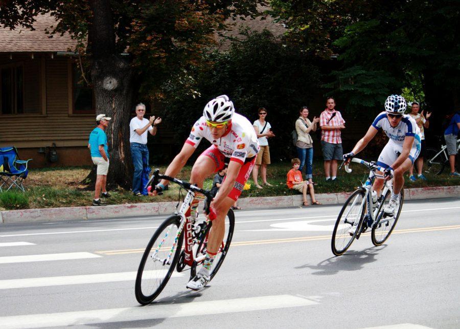 Pro bicyclists zip by Fort Collins residents as they near the finish line of the Pro Challenge Bike Race that dominated streets of Loveland, Windsor and Estes Park this past Saturday.