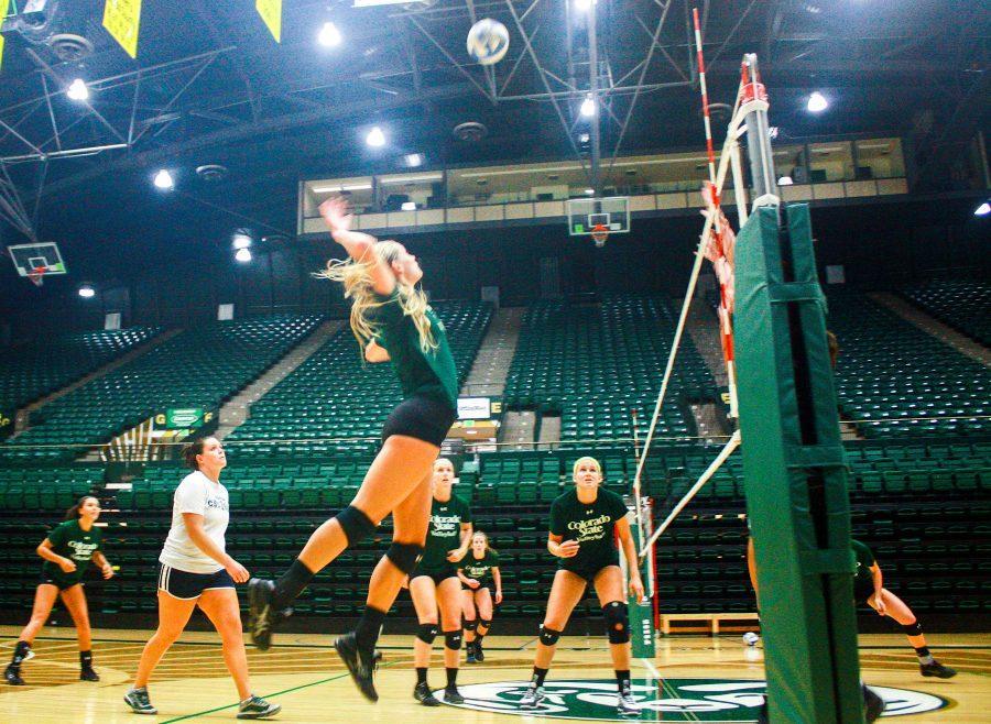 Middle blocker Cayla Broadwater goes up for a spike during practice in Moby on Monday afternoon. The Rams are preparing for this Wednesday's border war against Wyoming.