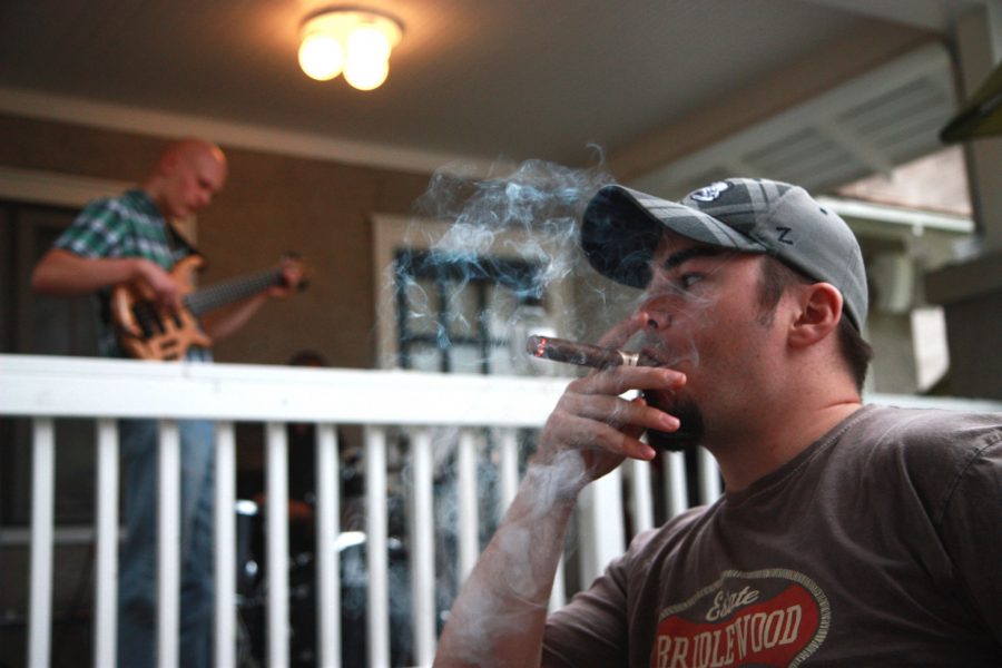 Wednesday evening, Jeff Wilson enjoys a cigar and jazzy tunes played by the Tom Barbour Trio at The Mayor of Old Town. Every Wednesday from 6pm to 10pm, The Mayor hosts Cigar and Pipe smoking on the patio with cool mixed drinks, 100 beers on tap, and a live band.