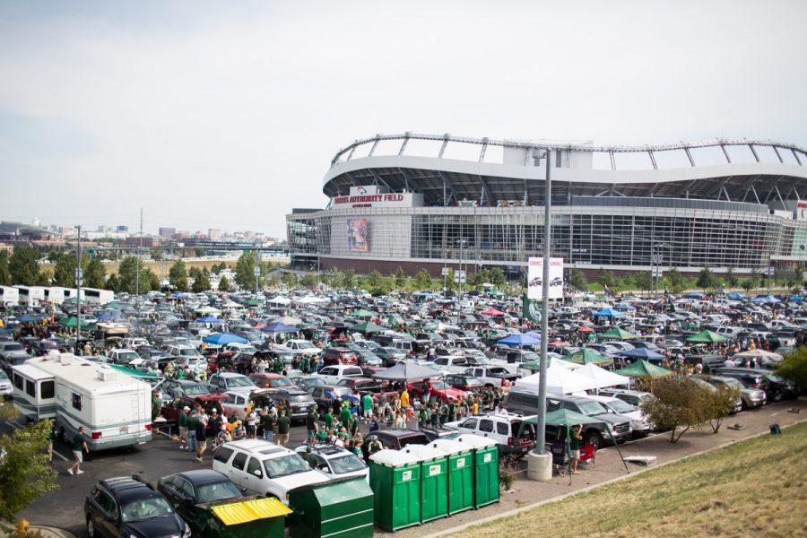 Tailgaters flood the Sports Authority Field parking lots before the Annual Rocky Mountain Showdown Sunday. Photo by Hunter Thompson