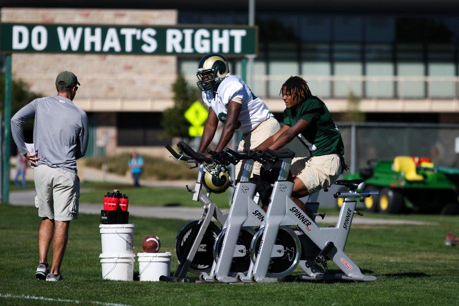 Sophomore safety Trent Matthews (16) and Freshman wide receiver Jordon Vaden (11) work on some cardio at practice Tuesday afternoon. The Ram's hope to further perfect their game during their bye week this week.