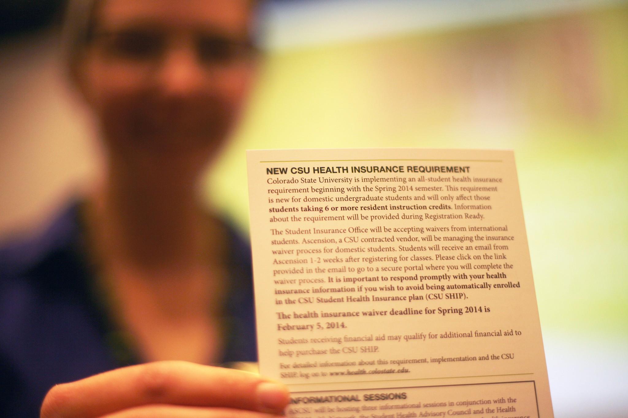 ASCSU Executive Direct of Health Mackenzie Whitesell holds up an informational card about the change in the CSU health care requirements with the implementation of Obamacare. Health insurance is now mandatory for all CSU students to have and if student’s do not provide proof of their health insurance by Feb. 5th they will be automatically enrolled in CSU’s health plan.