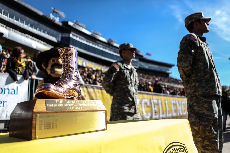 ROTC members protect the Bronze Boot at War Memorial Stadium in Wyoming in 2013.