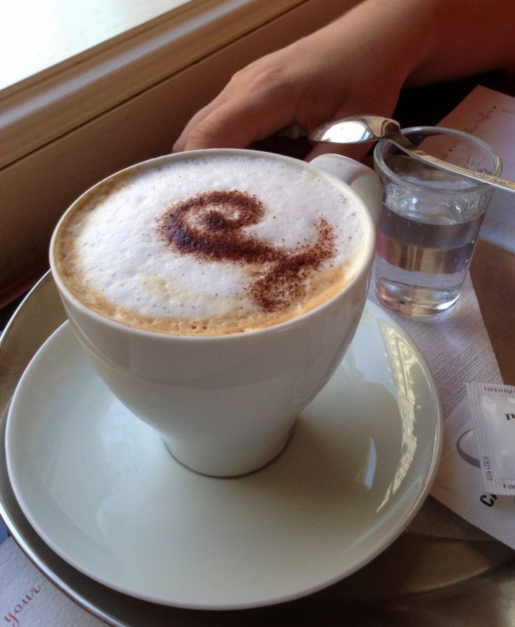 Cappuccino from Cafe Louvre served with cold water. (Photo by Lauren Klamm)