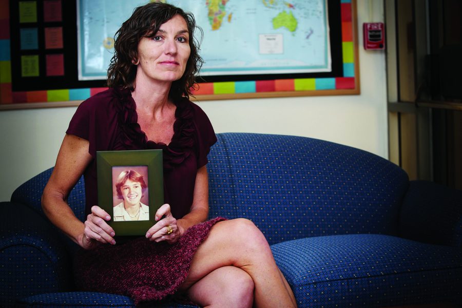 Journalism professor Chryss Cada holds a picture of her brother, who took his life 30 years ago at the age of 15. Cada stated that many individuals take their own life thinking they will not be missed , which in her experience was untrue.