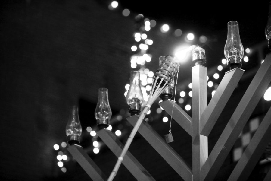 A menorah is lit in Old Town Fort Collins Monday night.