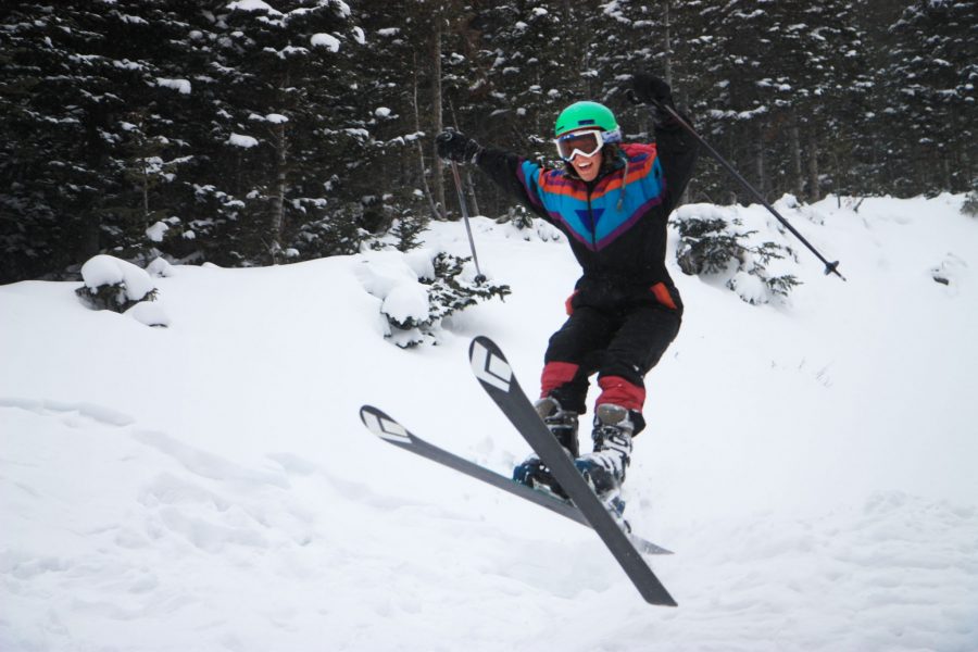 Claire Tortorelli flys off of a snow jump her and friends made while backcountry skiing near Cameron Pass. As the days count down to break, CSU students are filled with snow-filled dreams of hut trips, ski passes, and relaxing nights with hot coco and friends.