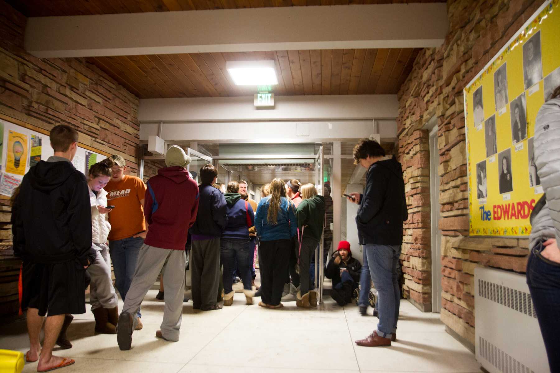 Firefighters and Police respond to a flood at Edwards Hall Sunday night. The call reportedly came after a student on the third floor accidentally hit a sprinkler, causing it to go off.