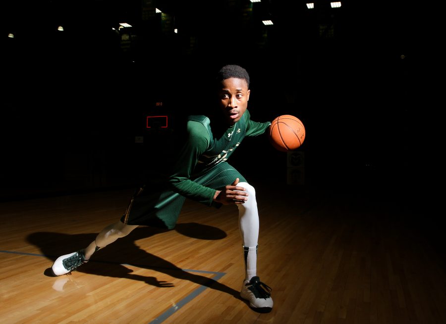 Junior guard Jon Octeus (5) looks towards another season with the Rams. Octeus joined the Rams basketball team last year and has made an appearance in all games since then.