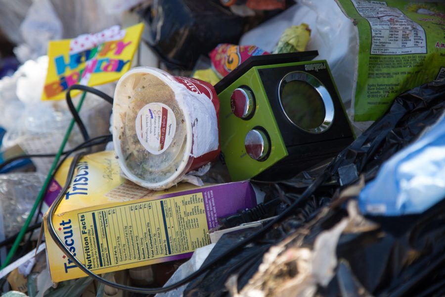 A variety of waste waits to be sorted during yesterdays waste audit on the plaza. The annual event acts as a visual message showing passing students a faulty how much of the on campus trash can actually be composted and recycled.