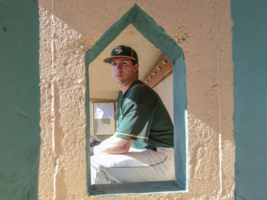 Colorado State center fielder Greg Hart in the dugout at City Park Fields, Hart is leading the team in runs with 16 in 17 games.