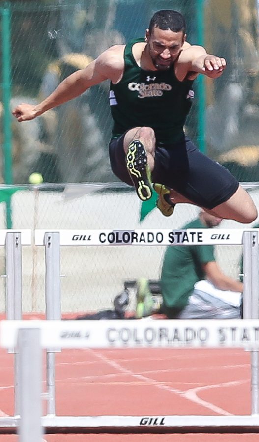 Colorado State runner Trevor Brown clears a hurdle next to on his way to a win in the 400m hurdles on at the Fum Mcgraw Quadrangluar on Saturday. Brown was named Mountain West player of the week after his performance at the meet.