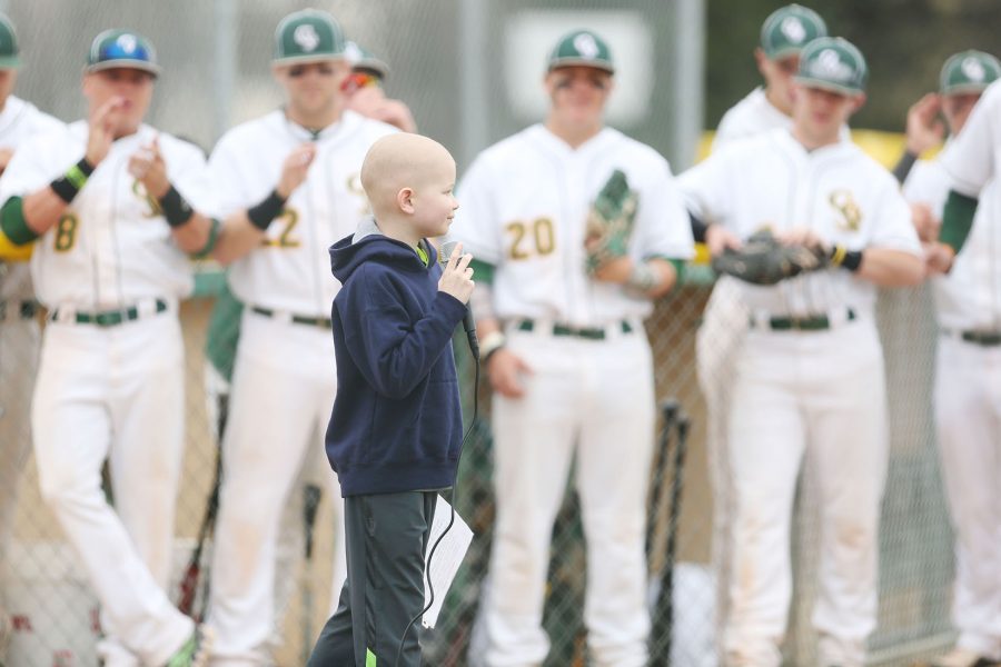 Lance Gorton, 8, finishes his speech before the CSU baseball game Saturday morning. Gorton is being treated for leukemia in Dallas, Texas and was honored at the game during a charity event to raise money for Child Life Zones.
