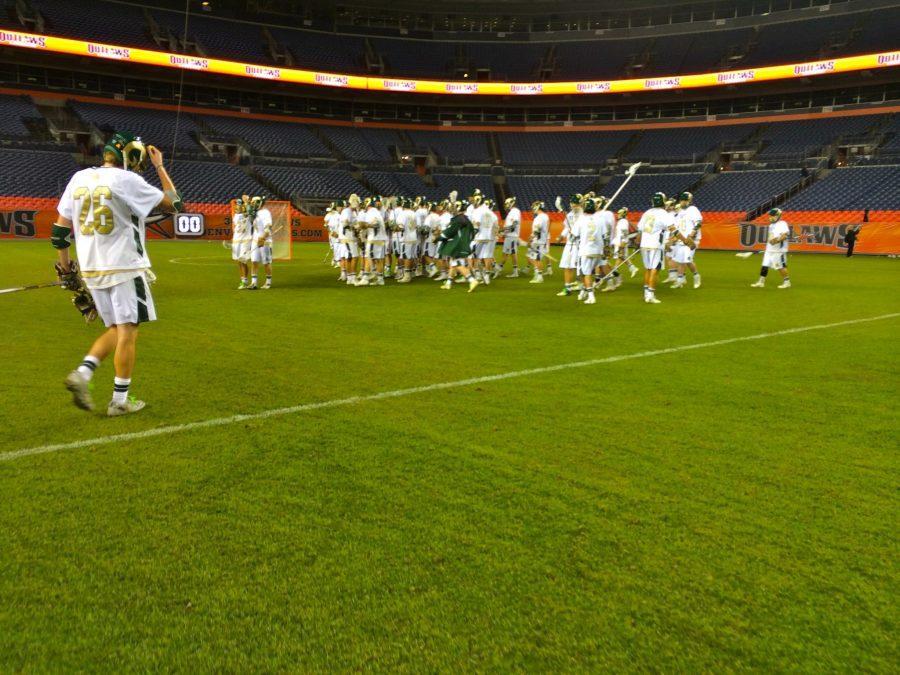 CSU men's lacrosse falls to CU for the second time in 15 years. Players coming together at the final buzzer with heads down. 