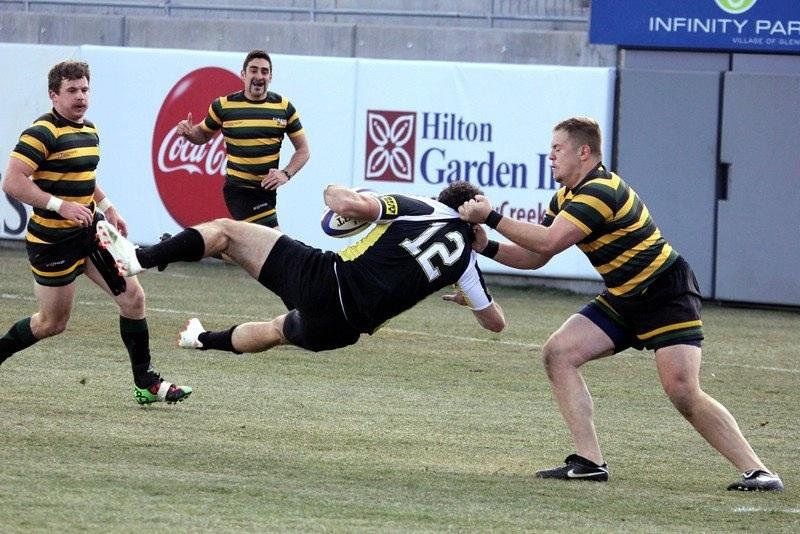 A member of the CSU club rugby team makes a tackle in 2014.