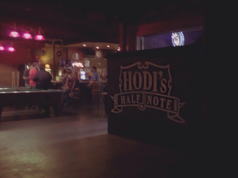 A small group gathers at Hodis Half Note for Monday night stand-up comedy.