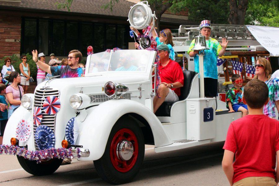 A firetruck starts the Fourth of July Parade (Photo credit: Katie Schmidt).