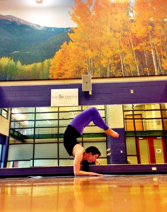 Student Keenan Zeller practices yoga at the Rec Center. Photo credit: Hannah Daley 