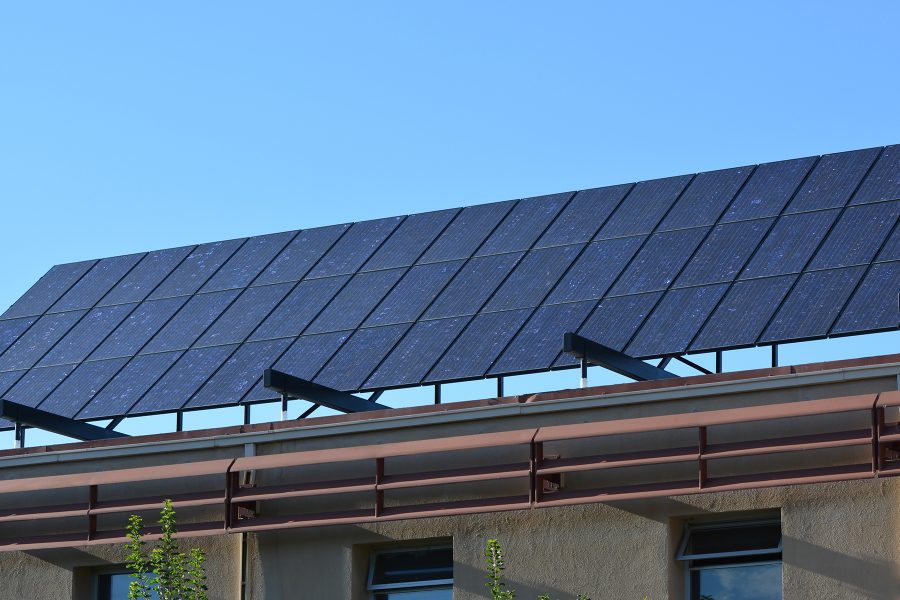 Solar panels sit on the Engineering building at Colorado State University. Solar panel additions are common on other buildings throughout the campus.