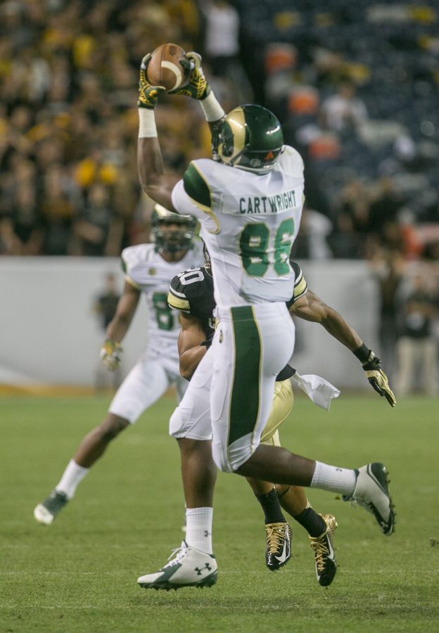 Colorado State tight end Kivon Cartwright catches a pass in last years season opener vs. Colorado. (Austin Simpson/Collegian)