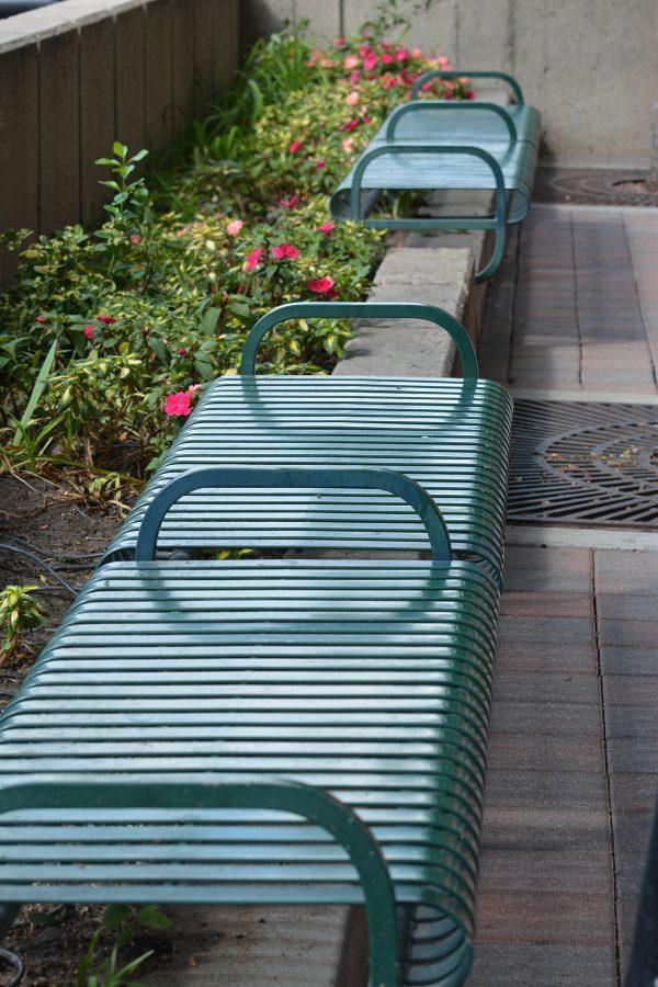 Benches line the streets in Old Town Fort Collins for people to sit and rest. However,these benches are where much of the homeless population in Fort Collins can be found. (Photo Credit: Megan Fischer)