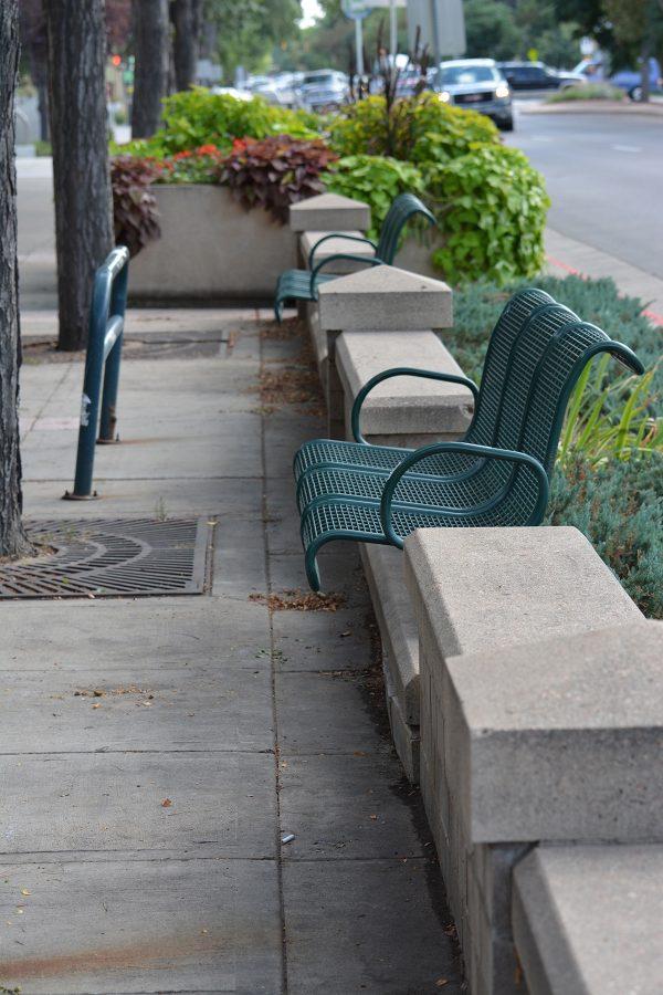 Benches line the streets in Old Town Fort Collins for people to sit and rest. However,these benches are where much of the homeless population in Fort Collins can be found. (Photo Credit: Megan Fischer)