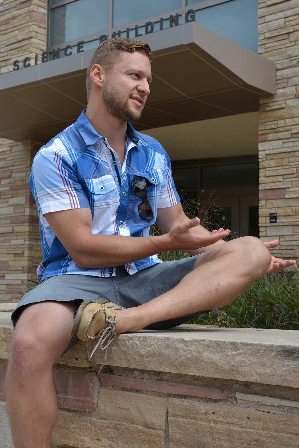 Michal Kmita, a Colorado State alumnus, explains his organization, Invictus Initiative. Kmita came to campus Friday to recruit volunteers for the organization, which takes a different approach to humanitarian development. (Photo Credit: Megan Fischer)