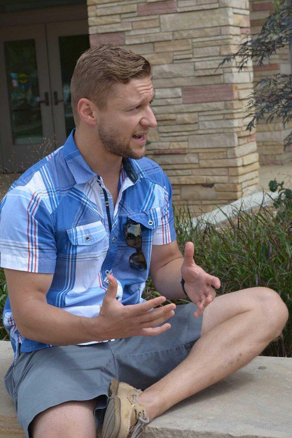 Michal Kmita, a Colorado State alumnus, expressing his passion for humanitarian development. Kmita came to campus Friday to recruit volunteers for his organization, Invictus Initiative, which takes a different approach to humanitarian development. (Photo Credit: Megan Fischer)