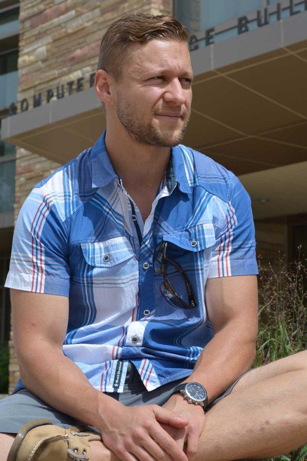 Colorado State alum, Michal Kmita, expressing his passion for humanitarian development. Kmita came to campus Friday to recruit volunteers for his organization, Invictus Initiative. The organization takes a different approach to humanitarian development. (Photo Credit: Megan Fischer)