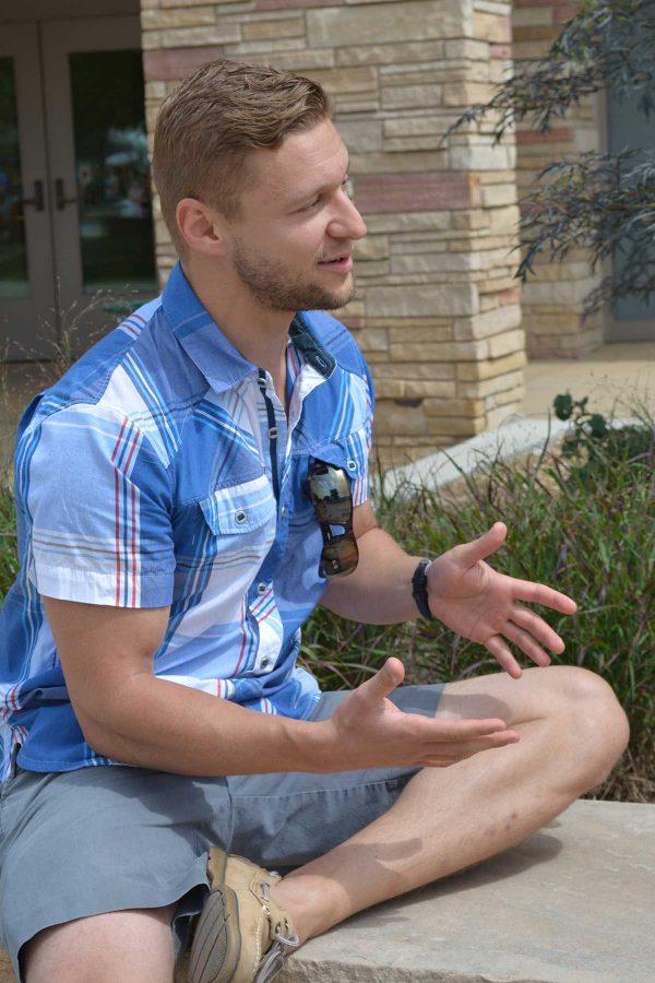 Colorado State alumnus, Michal Kmita, expressing his passion for humanitarian development. Kmita came to campus Friday to recruit volunteers for his organization, Invictus Initiative. The organization takes a different approach to humanitarian development. (Photo Credit: Megan Fischer)