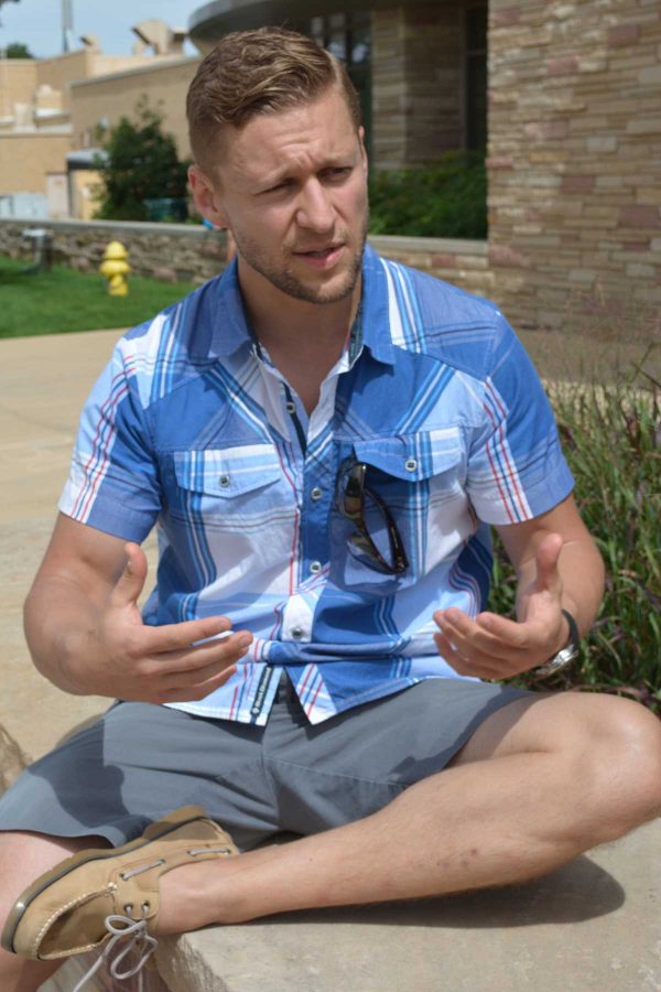 Michal Kmita, a Colorado State alumnus, expressing his passion for humanitarian development. Kmita came to campus Friday to recruit volunteers for his organization, Invictus Initiative, which takes a different approach to humanitarian development. (Photo Credit: Megan Fischer)