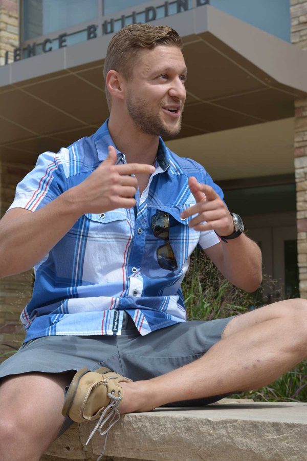Colorado State alumnus, Michal Kmita, expressing his passion for humanitarian development. Kmita came to campus Friday to recruit volunteers for his organization, Invictus Initiative. The organization takes a different approach to humanitarian development. (Photo Credit: Megan Fischer)