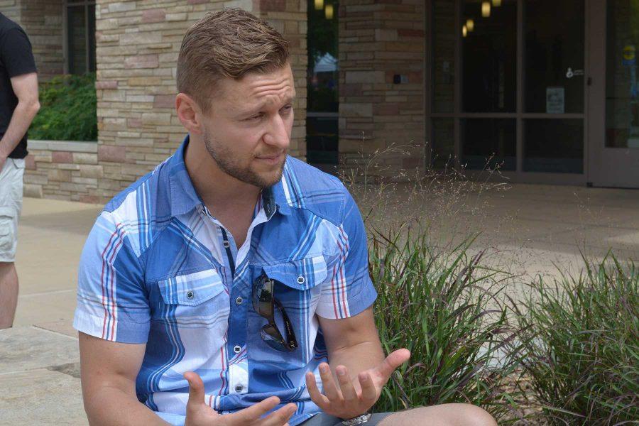 Michal Kmita, a Colorado State alumnus, expressing his passion for humanitarian development. Kmita came to campus Friday to recruit volunteers for his organization, Invictus Initiative, whichtakes a different approach to humanitarian development. (Photo Credit: Megan Fischer)