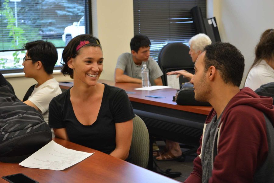 Rachel Witt, a senior in human development and family sciences talks with Serage Latiwish, a masters student in civil engineering. The Conversation Partners Program through INTO CSU creates an environment in which international students meet domestic students and volunteers to talk about thier lives here and in their home countries.