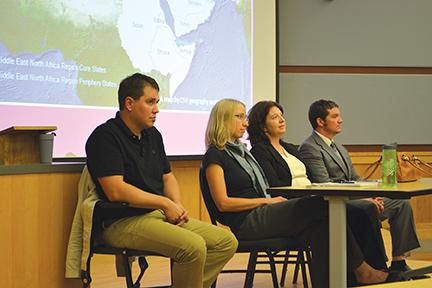 (From left) Sergeant Chris Kline, Dr. Andrea Williams, Dr. Gamze Cavadar and Sergeant First Class, Noah Roberts, share their views on the conflict in the Middle East at Making Sense of the Middle East discussion panel held on Tuesday night in Clark A.(Photo credit: Megan Fischer)