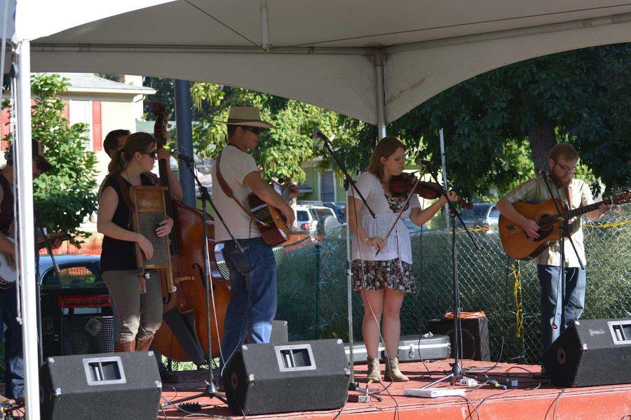 Members of the Blue Grama bluegrass group play at the 2014 Xaniscape Festival put on by the Geller Center. The festival featured local vendors, food and music.(Photo Credit: Megan Fischer)