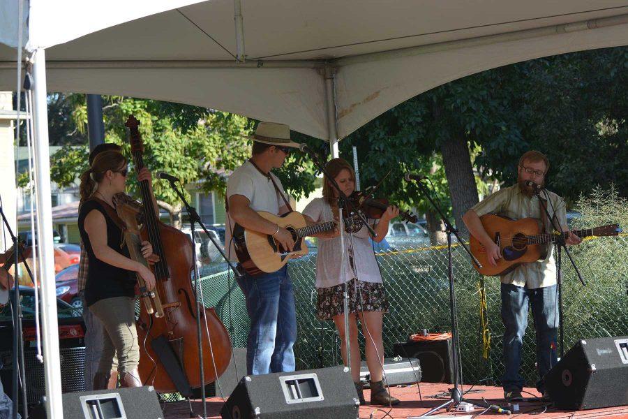 Members of a local band, The Blue Gramas, play at the 2014 Xaniscape Festival hosted by the Geller Center. The event featured local music, vendors, and restaurants. (Photo Credit: Megan Fischer)