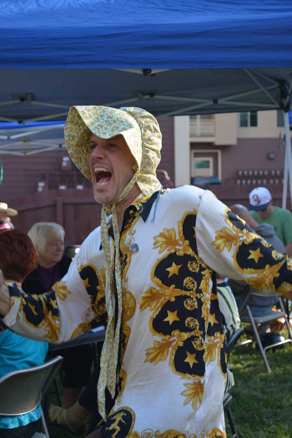 Steve Dewey dances along to the local music at the 2014 Xaniscape Festival. The festival featured local bands, restaurants, and vendors.