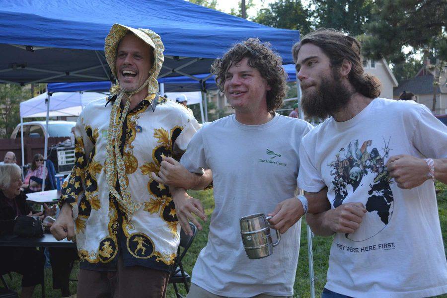 (From left), Steve Dewey, biochemestry sophomore Johnny Roos, and Casey Hanebuth dance along to the local music athe the Xaniscape Festival. (Photo Credit: Megan Fischer)