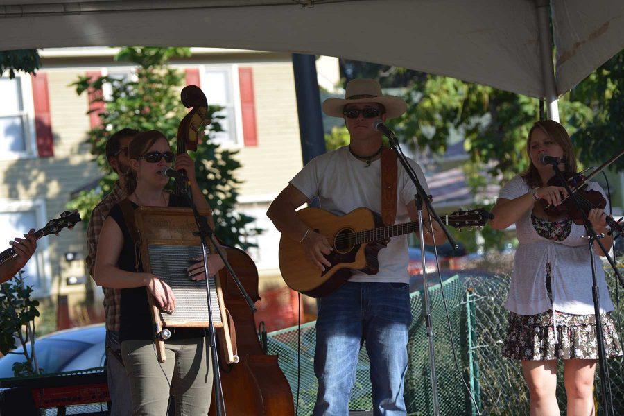 Members of the Blue Grama bluegrass group play at the 2014 Xaniscape Festival put on by the Geller Center. The festival featured local vendors, food and music. (Photo Credit: Megan Fischer)