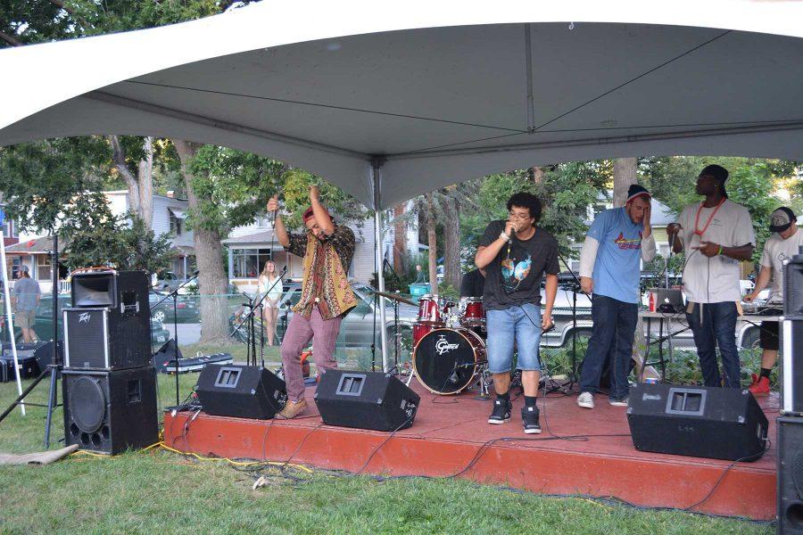 Members of a local band, Cosmic Lum, play at the 2014 Xaniscape Festival hosted by the Geller Center. The event featured local music, vendors, and restaurants. (Photo Credit: Megan Fischer)
