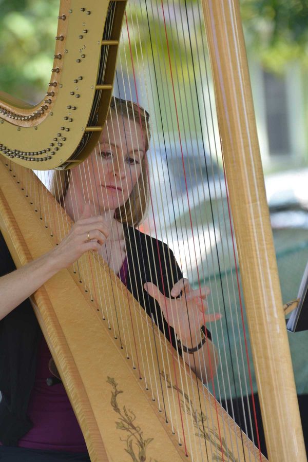 Tonya Jillings, plays the harp during the Geller Center Xaniscape festival.Tonya is part of the Synesthesia group in Denver, CO. (Photo Credit: Megan Fischer)
