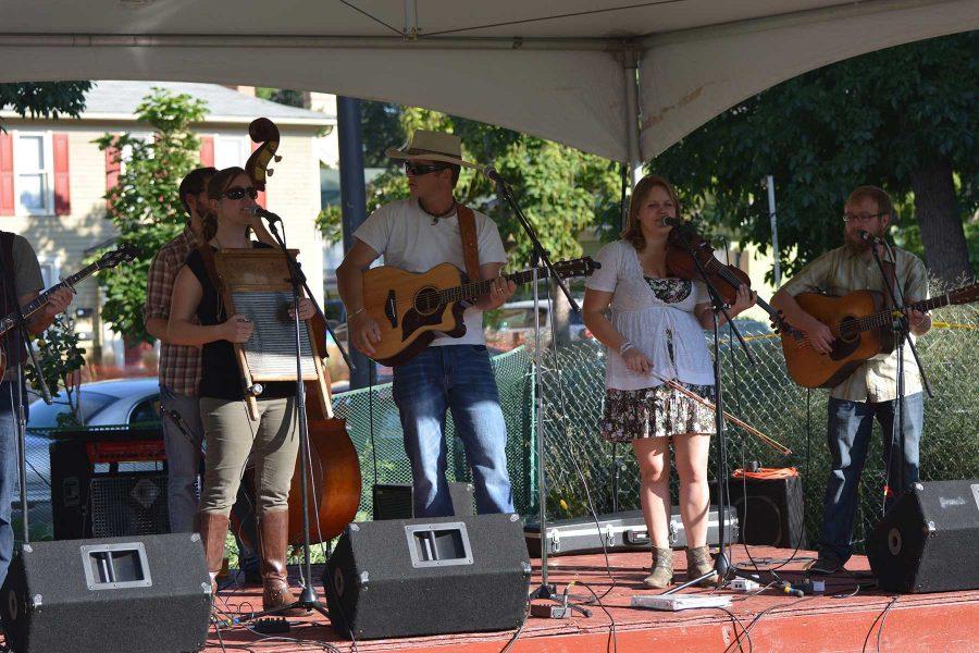 Members of the Blue Grama bluegrass group play at the 2014 Xaniscape Festival put on by the Geller Center. The festival featured local vendors, food and music. (Photo Credit: Megan Fischer)