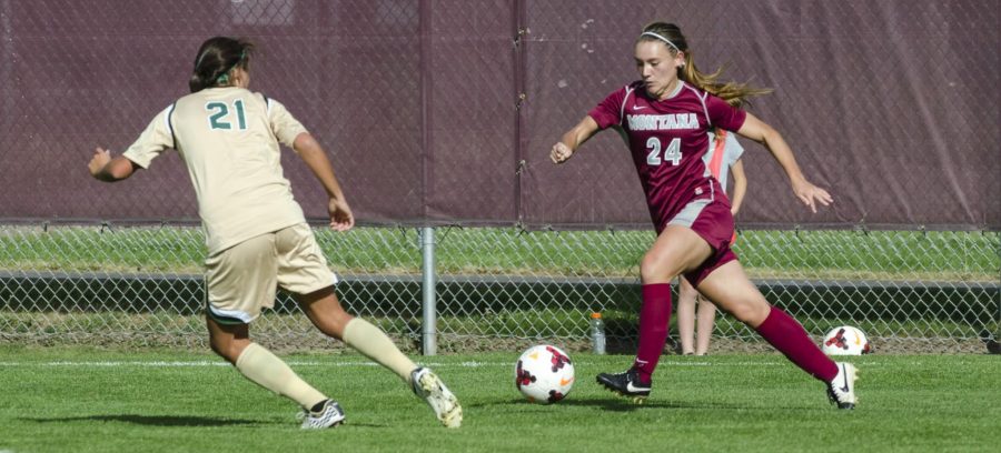 Colorado State defender Megan Speed (21) marks a University of Montana player during Saturday's 2-0 road loss. (Photo Courtesy: Griz Athletics)