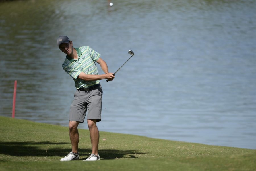Colorado State golfer Cameron Harrell hits a chip shot during last year's Mountain West Championships.