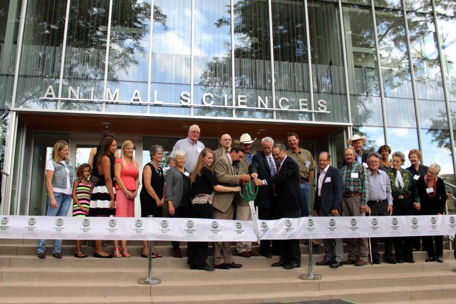 Dr. Tony Frank and Dr. Kevin Pond, head of the Department of Animal Sciences, cut the ribbon along with several supporters of the newly renovated Animal Sciences Building on Wednesday afternoon.