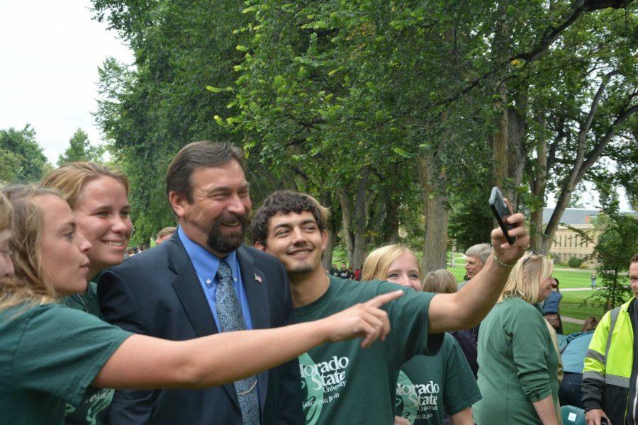 CSU President Tony Frank takes a photo with students after Franks annual address to campus. (Photo Credit: Skyler Leonard)