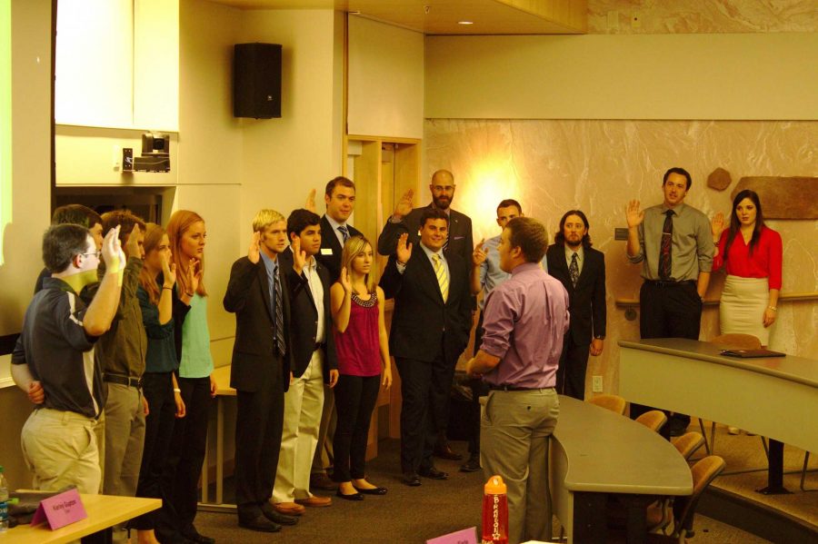 The newest members of the Student Fee Review Board are sworn in at ASCSU Senate meeting in the Behavioral Science Building Wednesday night. (Photo credit: Jonathan Matheny)